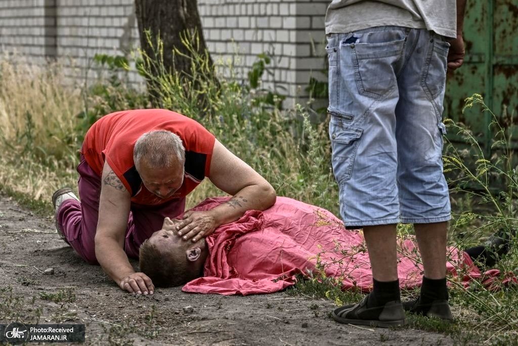 عکسی دردناک از اجساد اوکراینی های کشته شده در جنگ