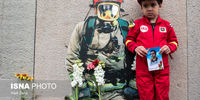 ادای احترام به قربانیان فاجعه پلاسکو در پای ویرانه ساختمان + عکس