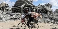 عکسی از بازگشت فلسطینی ها به غزه بعد از توافق حماس و اسرائیل