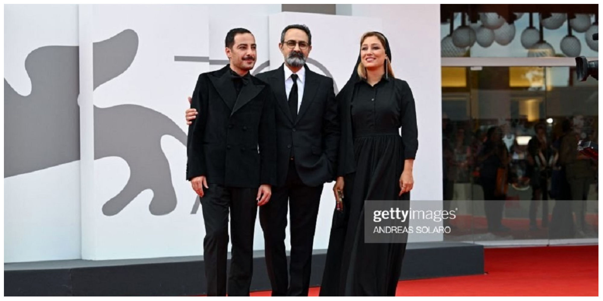 نوید محمدزاده و همسرش بعد از حاشیه کن روی فرش قرمز ونیز+فیلم
