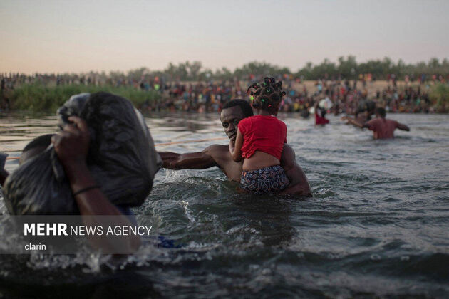 3896529_migrantes-haitianos-vadean-el-rio___Vk5FnmJl7_1200x0__1