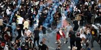 درگیری پلیس کانادا با معترضان/ شلیک گاز اشک‌آور +فیلم
