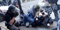 ضرب و شتم معترضان مردمی با باتوم توسط پلیس آمریکا در لس‌آنجلس