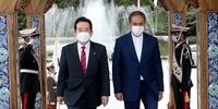 عکسی از دست دادن متفاوت جهانگیری و نخست وزیر کره جنوبی