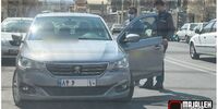 پژو ۳۰۱ با پلاک ملی وارد خیابان ها شد+عکس