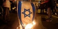 نماینده اردن در اتحادیه عرب پرچم اسرائیل را آتش زد