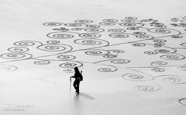 نقاشی روی شن‌های ساحل‎