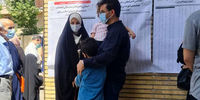 وزیر جوان روحانی به همراه همسر و فرزندان در حوزه رای گیری+ عکس