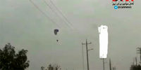 گرفتاری چترباز (پاراگلایدر) در دام کابل‌های برق/فیلم