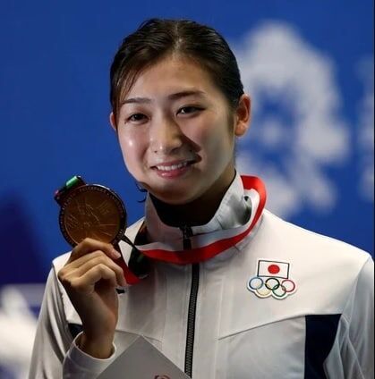 شاهکار دختر شناگر دچار سرطان؛ کسب سهمیه المپیک+عکس